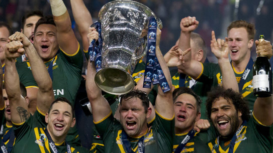 The Kangaroos with their trophy after winning the 2013 Rugby League World Cup final against New Zealand.