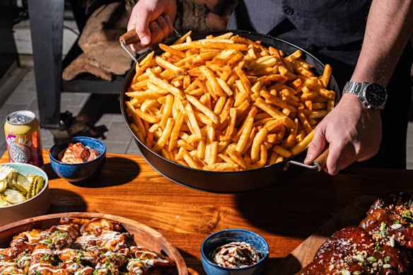 On Fridays, indulge in a $65 all-you-can-eat Southern feast at Bluestone American Barbecue, including twice-cooked fries dusted with smoked paprika.
