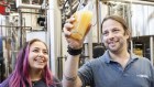 Hawkers Beer founder and CEO Mazen Hajjar and staff member Yostina Askander.