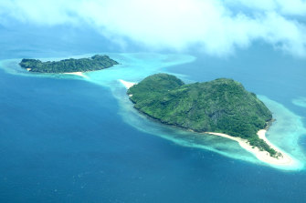 Dauar island in foreground with Waier in background, part of the southern stretch of the Torres Strait.