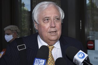 Clive Palmer speaks to the media outside the Federal Court in Sydney on Monday.
