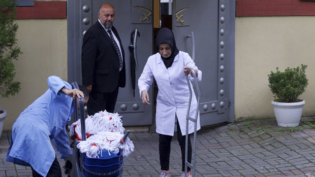 Cleaning personnel enter Saudi Arabia's Consulate in Istanbul before police arrived.