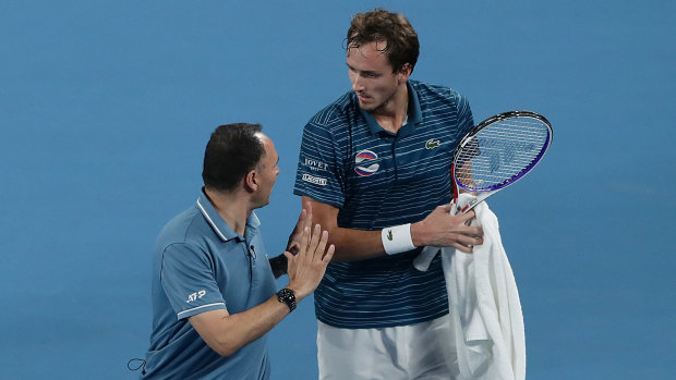 Daniil Medvedev of Russia is given a code violation warning by the umpire after exchanging words with Diego Schwartzman of Argentina.