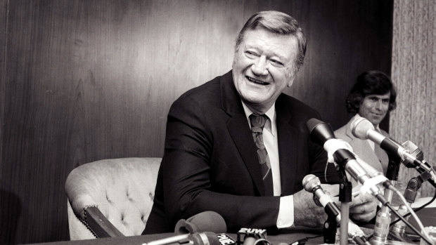 John Wayne at a press conference in Sydney in 1975