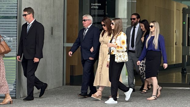 Wilkinson’s family leaves the Supreme Court in Brisbane after her accused killer Brian Earl Johnston pleaded guilty to murder.