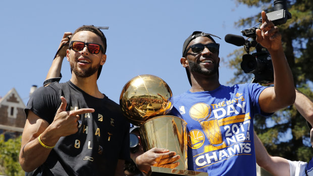 Steph Curry and Ian Clark at the 2017 victory parade.