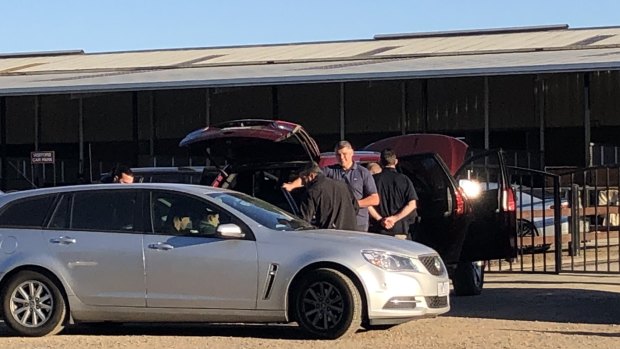 Police rad the stables of horse trainer Darren Weir on Wednesday.