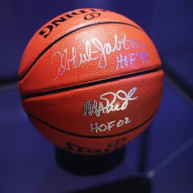 The exhibition includes signed basketballs.