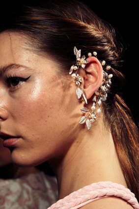 A model wears an ear cuff by Jeanette Maree in the Thurley show at Sydney's Fashion Week.
