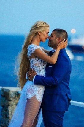 John Macris and his wife Victoria Karyda on their wedding day in Mykonos.