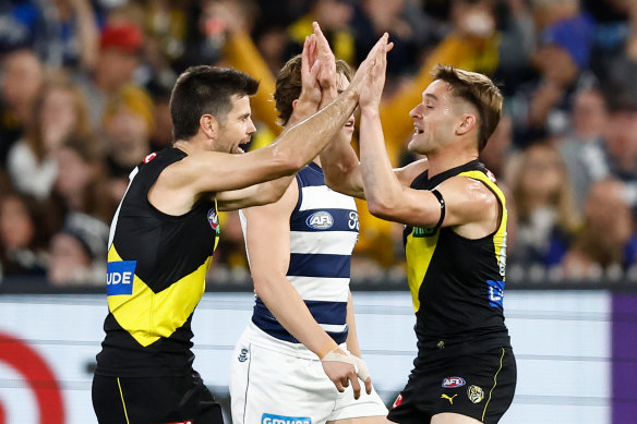 Trent Cotchin (left) and Jayden Short of the Tigers celebrate a goal.