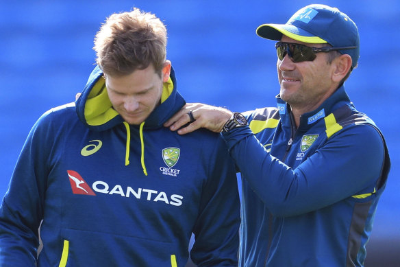 Australia coach Justin Langer, right, and Steve Smith. 