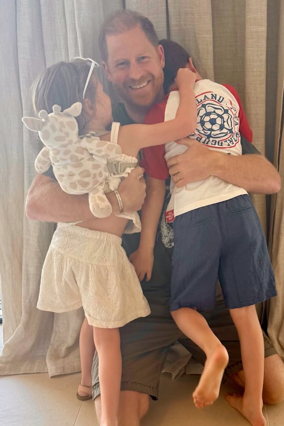 Harry with Archie and Lilibet in June.