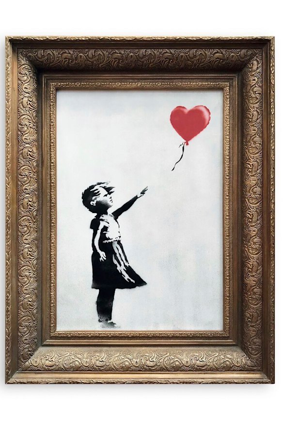 Banksy’s Girl with Balloon before it was shredded.