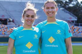 Carpenter and Hunt at Matildas training before the World Cup quarter-final.