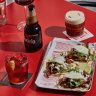 Al pastor tacos with grilled pork, salsa verde and pineapple.