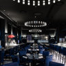 Grill Americano’s midnight blue dining room.