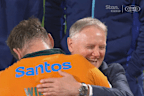 Joe Schmidt hugs Harry Wilson.
