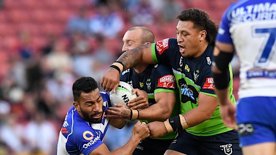 The tackle in which Raiders prop Josh Papalii (right) was sent off.