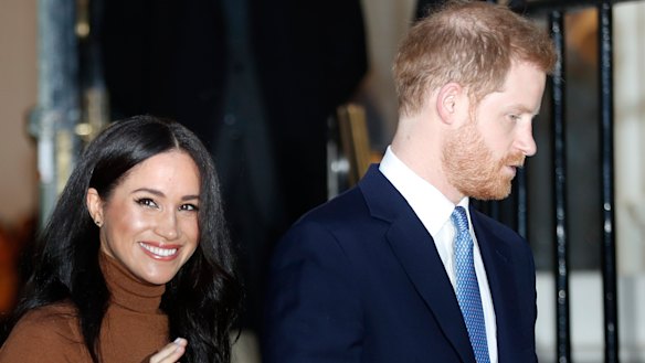 Britain's Prince Harry and Meghan, Duchess of Sussex, leave after visiting Canada House in London.