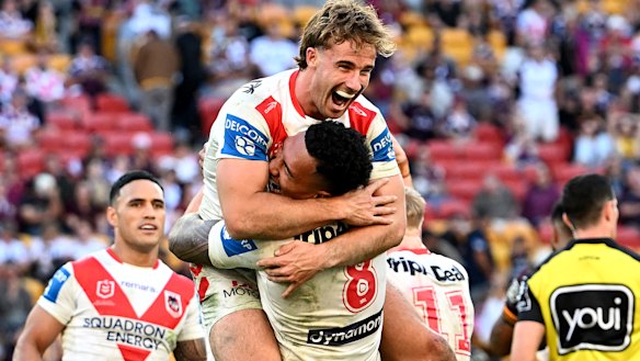 Young forwards Ryan Couchman and Loko Pasifiki Tonga celebrate the Dragons breakthrough win.