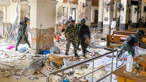 Security forces inspect the St Anthony's Shrine after an explosion hit St Anthony's Church in Kochchikade in Colombo, Sri Lanka.