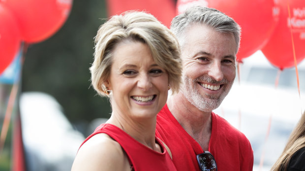 Kristina Keneally with her husband Ben, who is employed by Boston Consulting Group, which is advising the department on process.