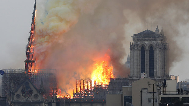 Notre-Dame Cathedral spire on the cusp of collapse. 