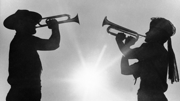 Two boy scout members play the bugle at the 12th World Boy Scout Jamboree at Farragut State Park in Idaho in 1967.
