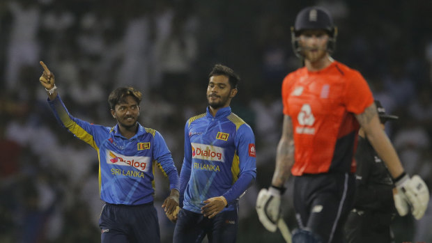 Sri Lanka's Akila Dananjaya celebrates the dismissal of England's Ben Stokes.