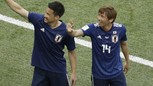 A winning system: Japan's Shinji Okazaki and Takashi Inui after the game.