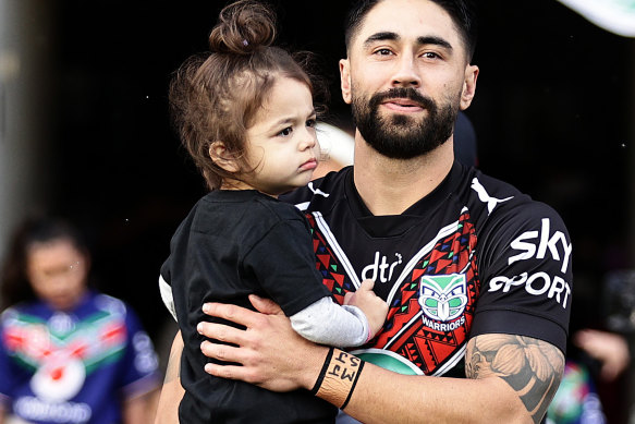 Shaun Johnson with his daughter Milah before kick-off against Cronulla.