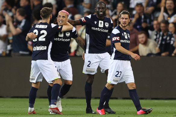 Jason Davidson of the Victory celebrates after scoring during the FFA Cup final.