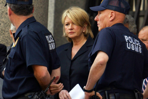 Martha Stewart is led away to begin her sentence in the minimum-security Alderson prison camp in West Virginia in 2004.