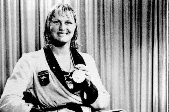 Shane Gould shows off one of her gold medals at the 1972 Munich Olympics.