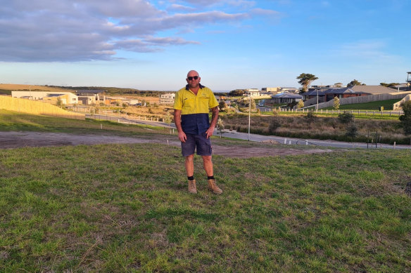 Wally Burns, 50, at his vacant block in Kilcunda which he is now selling due to the collapse of homebuilders Langford Jones Homes.