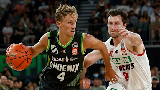 Phoenix’s Kyle Adnam drives to the basket against the Wildcats.