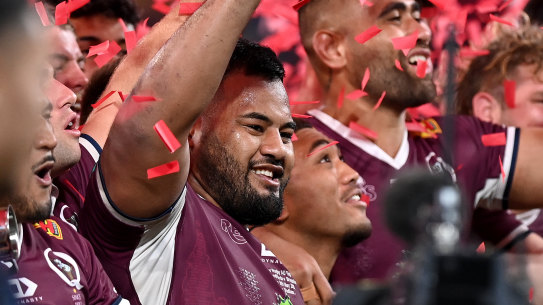 Taniela Tupou celebrates the Reds’ victory on Saturday night.