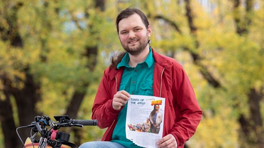 Josie with one of their dating flyers.