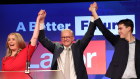 Anthony Albanese celebrates Labor’s election victory with partner Jodie Haydon and son Nathan.