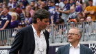 Gillon McLachlan and Anthony Albanese at the footy