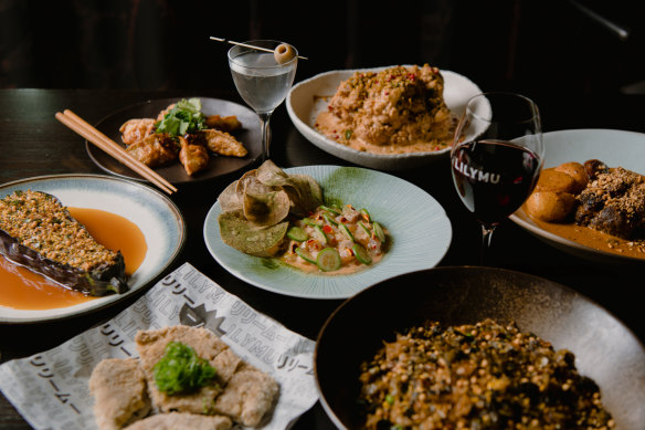 Kingfish and coconut ceviche and roasted eggplant with furikake from the Feast menu.