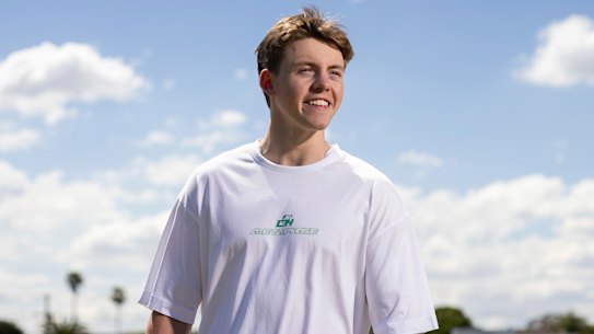 Luke, a keen footballer and coach of younger boys, at his home sports oval in Brighton.