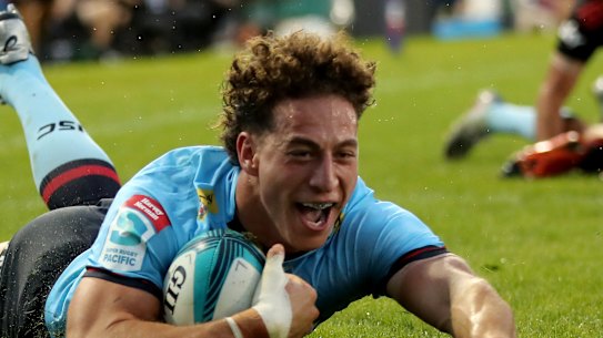 Mark Nawaqanitawase crosses for the Tahs.