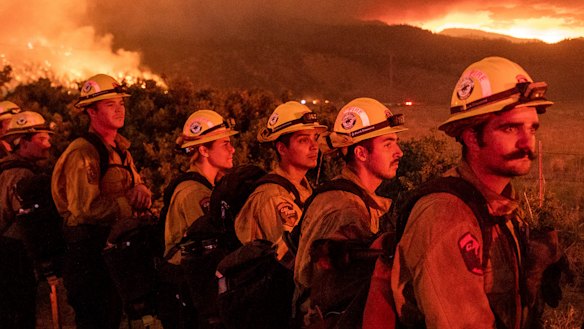Firefighters monitor the Sugar Fire, part of the Beckwourth Complex Fire, in Doyle, California last week.