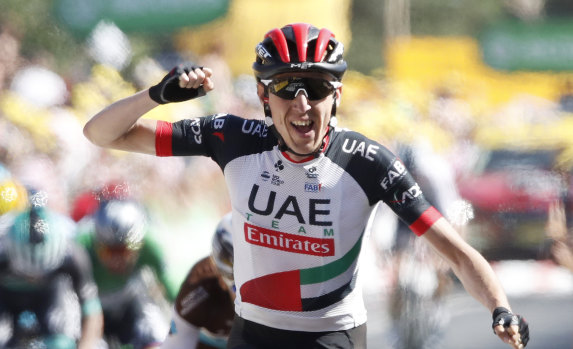Daniel Martin crosses the finish line to claim stage six of the Tour de France on Thursday.
