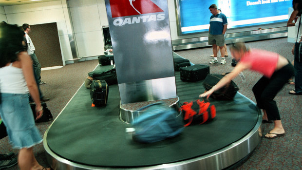 The woman was arrested over the theft of 18 items of luggage from carousels at Melbourne airport.