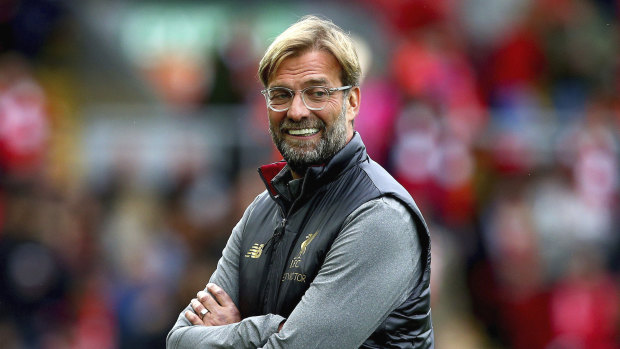 All smiles: Jurgen Klopp has led Liverpool to their best ever start to a season.