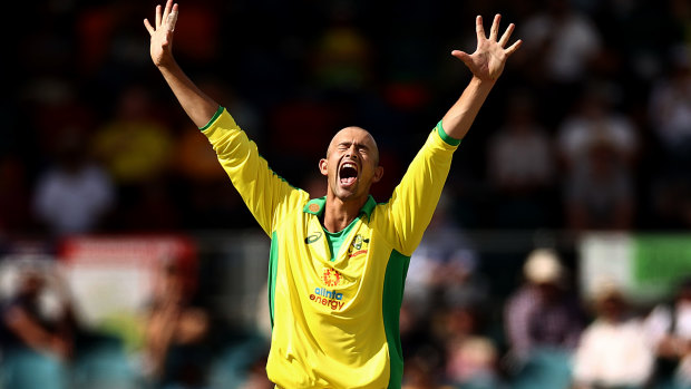 Ashton Agar of Australia celebrates after taking the wicket of KL Rahul of India during game three of the One Day International series between Australia and India at Manuka Oval.