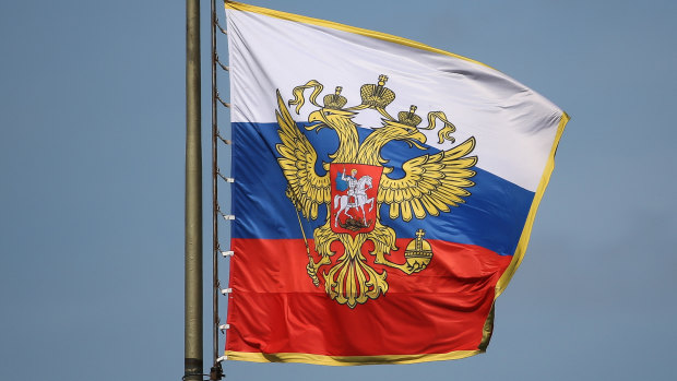 The double-headed eagle is in the Russian coat of arms and often appears on Russian flags.